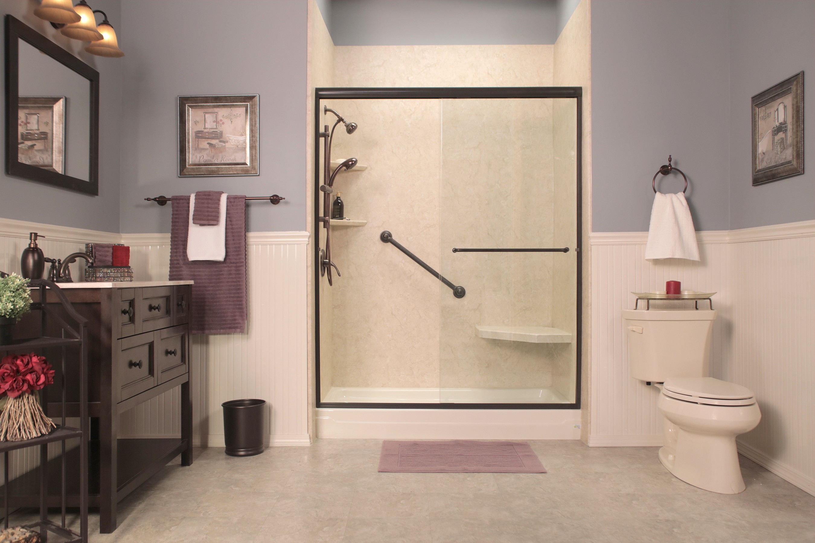 Beige tile shower with black-frame glass doors — North Texas home