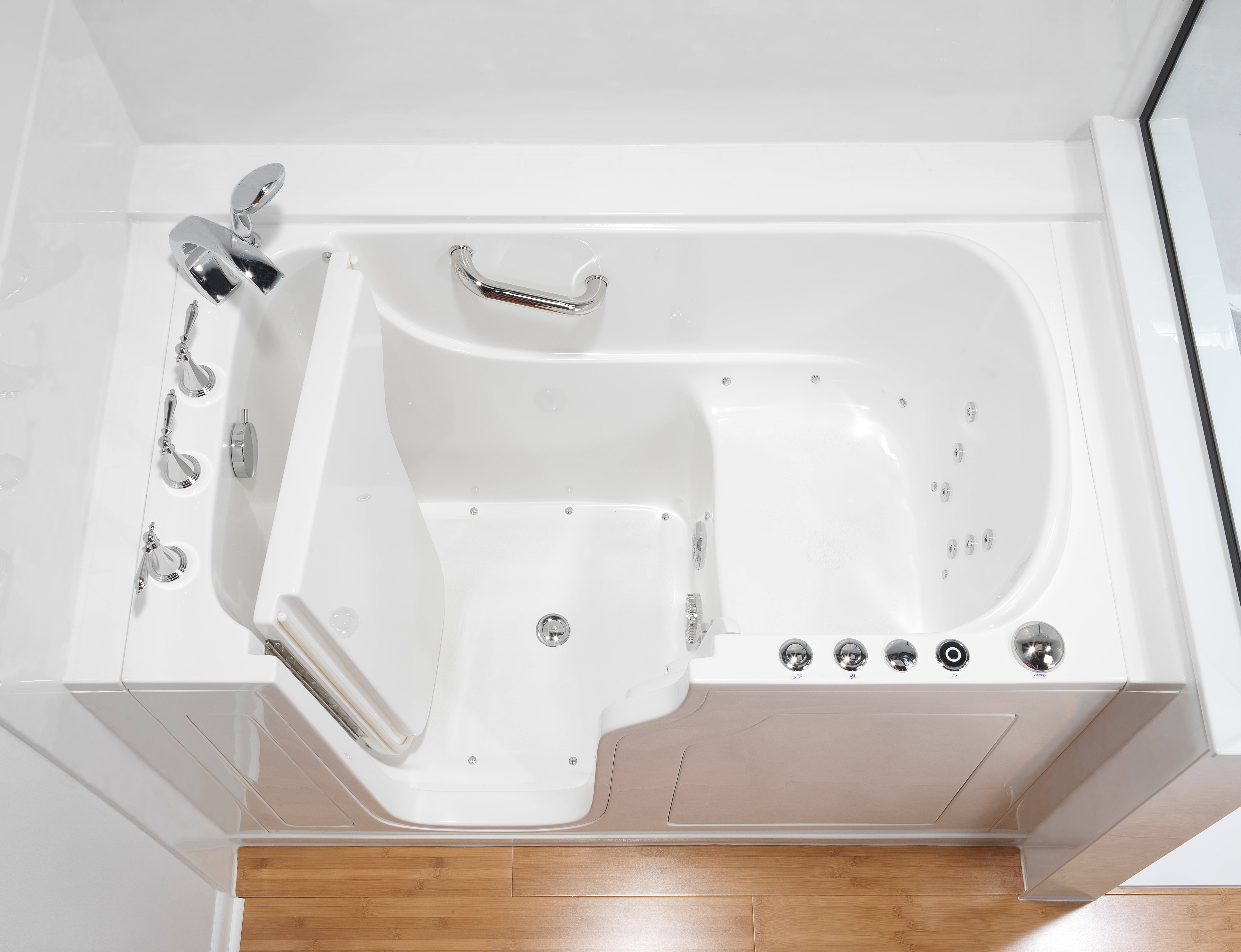 White walk-in tub with hydrotherapy jets — senior accessibility installation